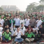 Doa, Haru, dan Solidaritas: Kisah Ribuan Ojol di GOR Sidoarjo